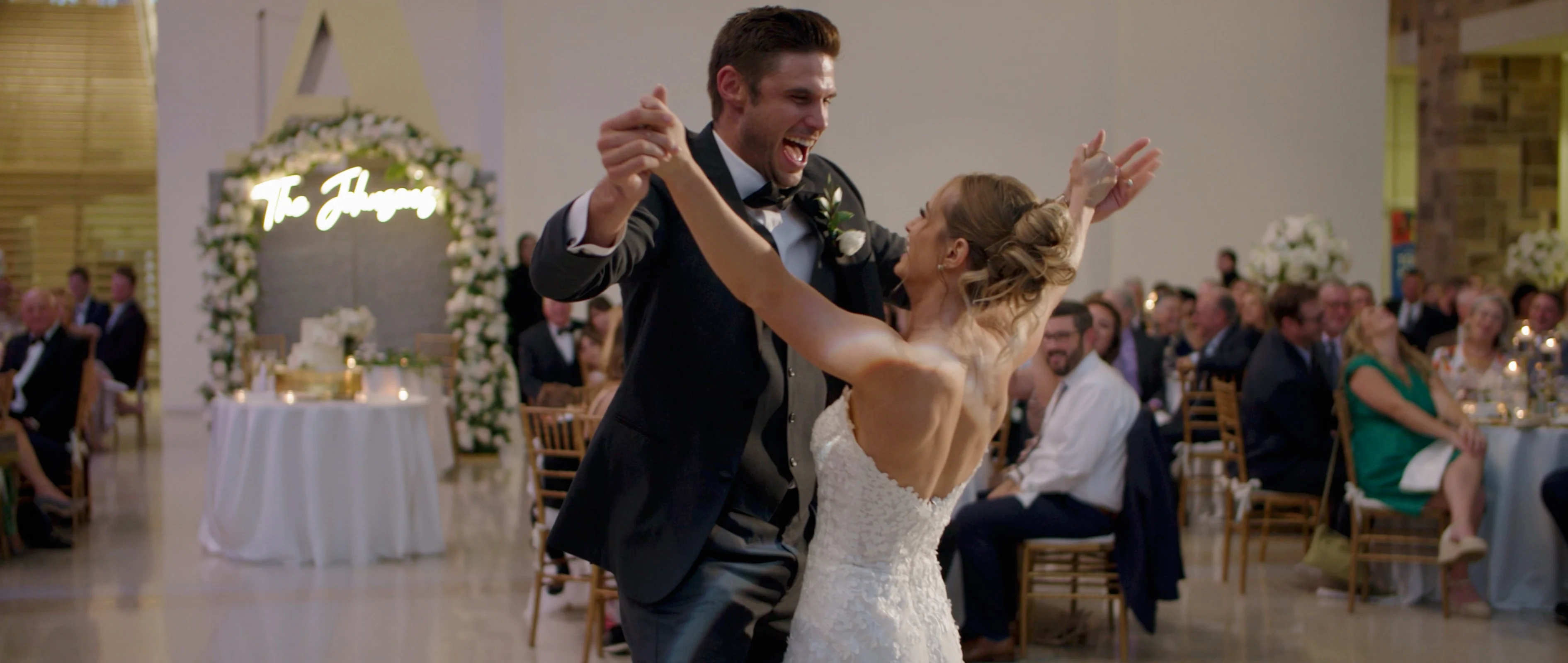 bride and groom dancing at indiana state museum